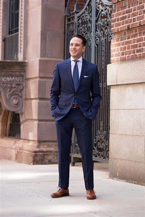 dark blue suit brown shoes.